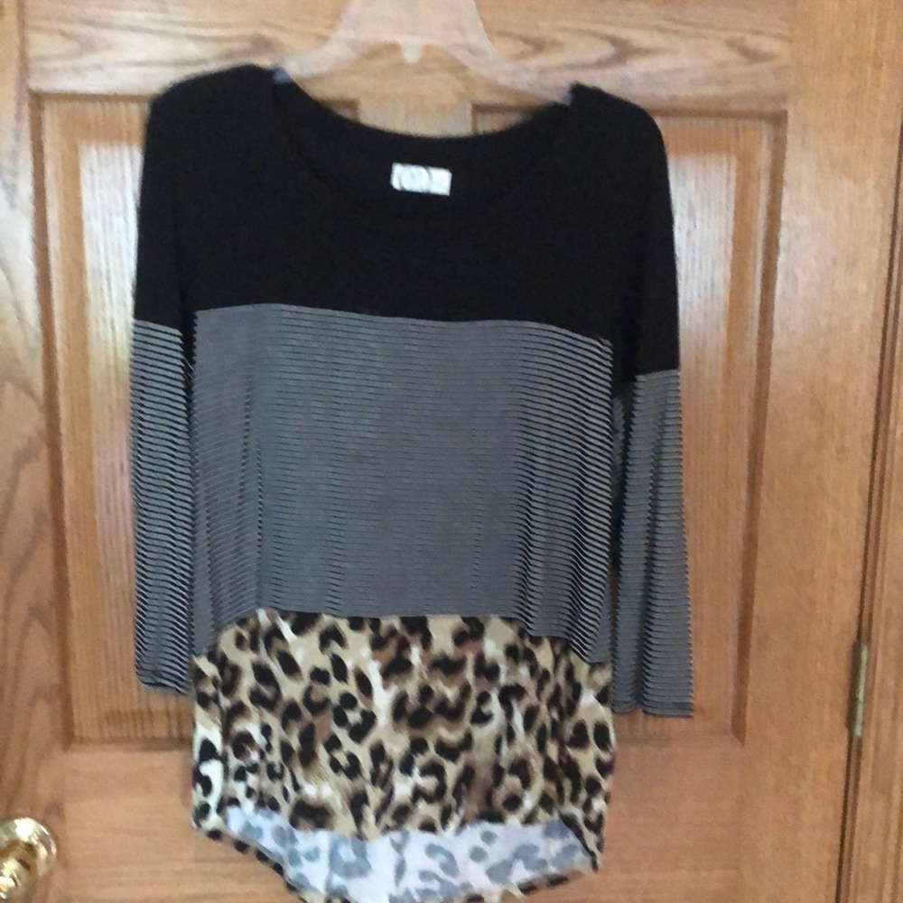 Tunic style top. Excellent condition